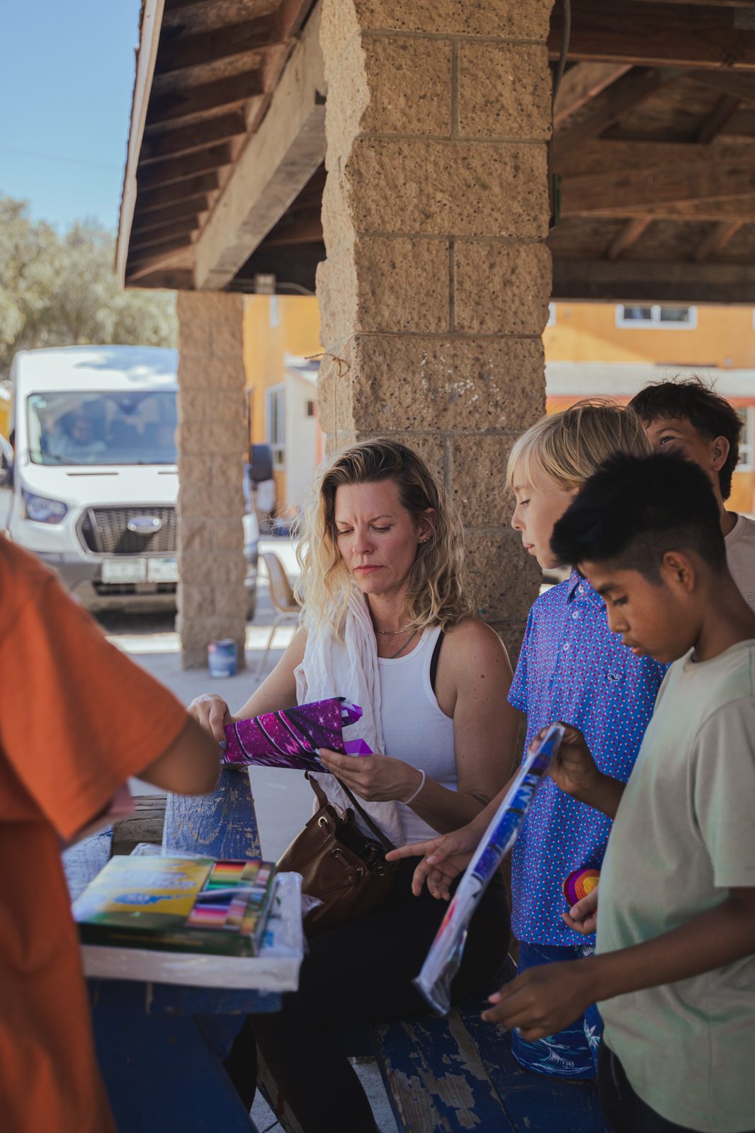 Volunteer making kites with children